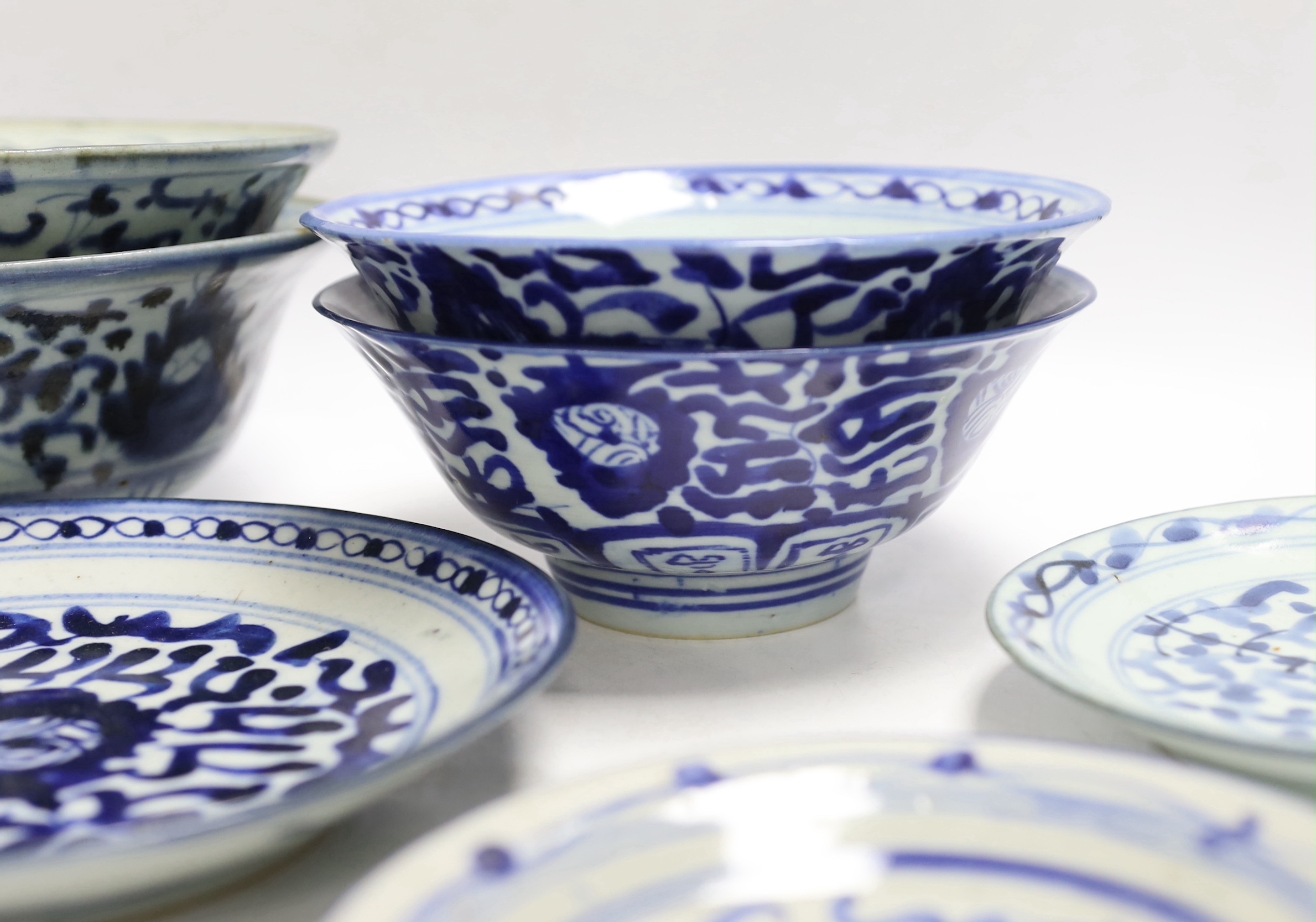 Thirteen Chinese blue and white dishes, plates and bowls, largest diameter 17.5cm